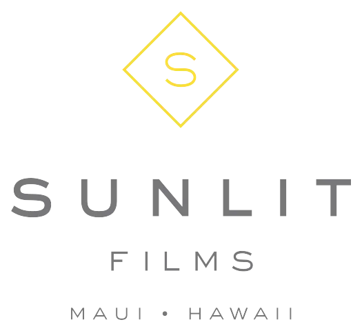 Logo of Sunlit Films featuring a stylized "S" inside a yellow diamond, with the text "SUNLIT FILMS" below it.